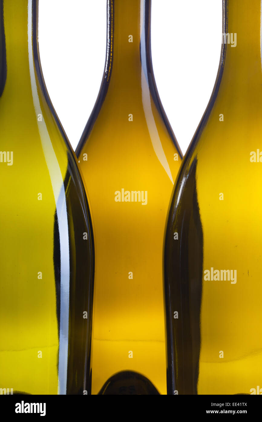 Detail of three empty wine bottles on a white background Stock Photo ...