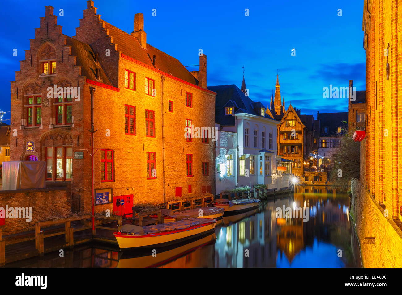 Cityscape with the picturesque night canal Dijver in Bruges Stock Photo