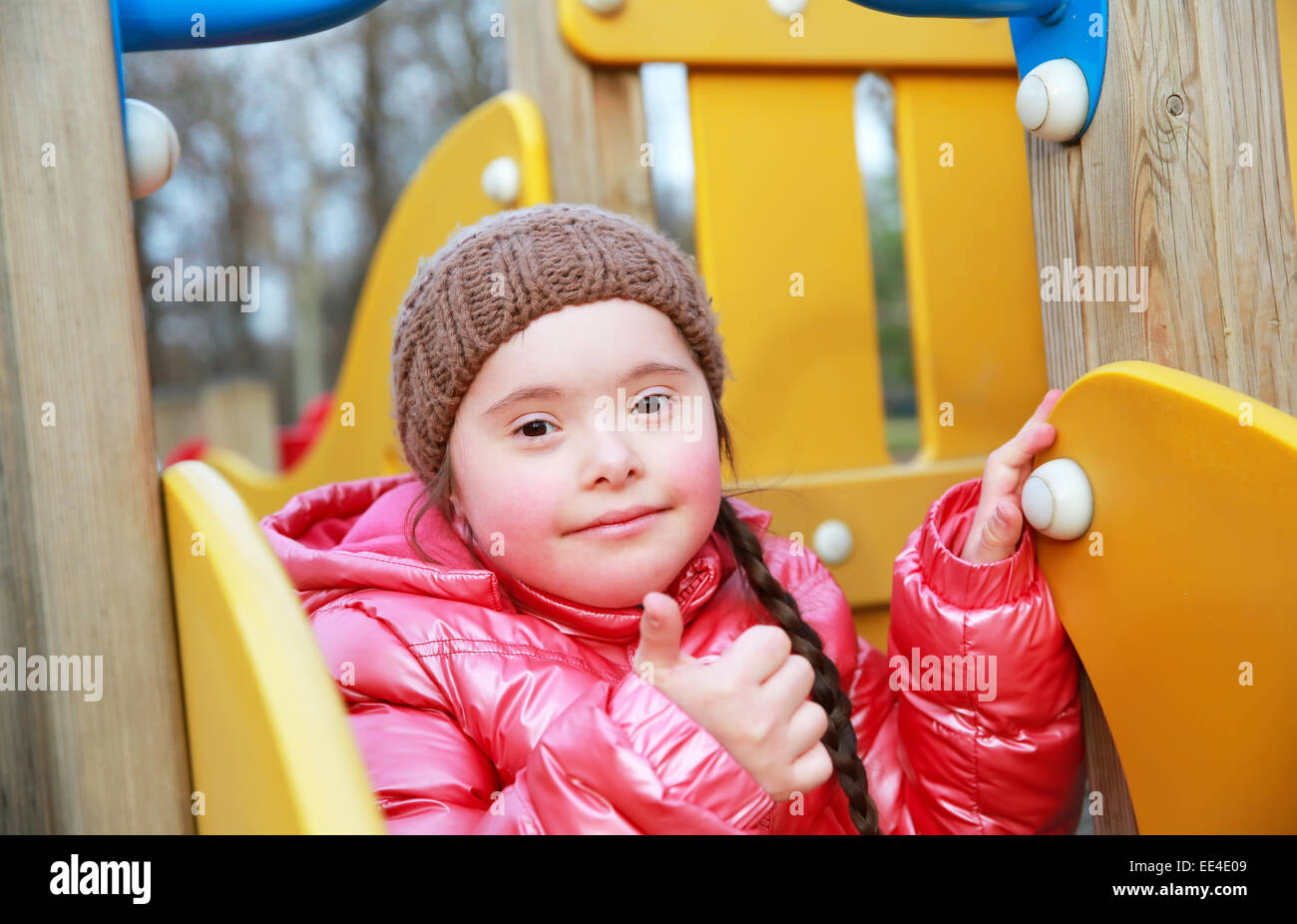 Portrait of beautiful girl on the playground Stock Photo - Alamy