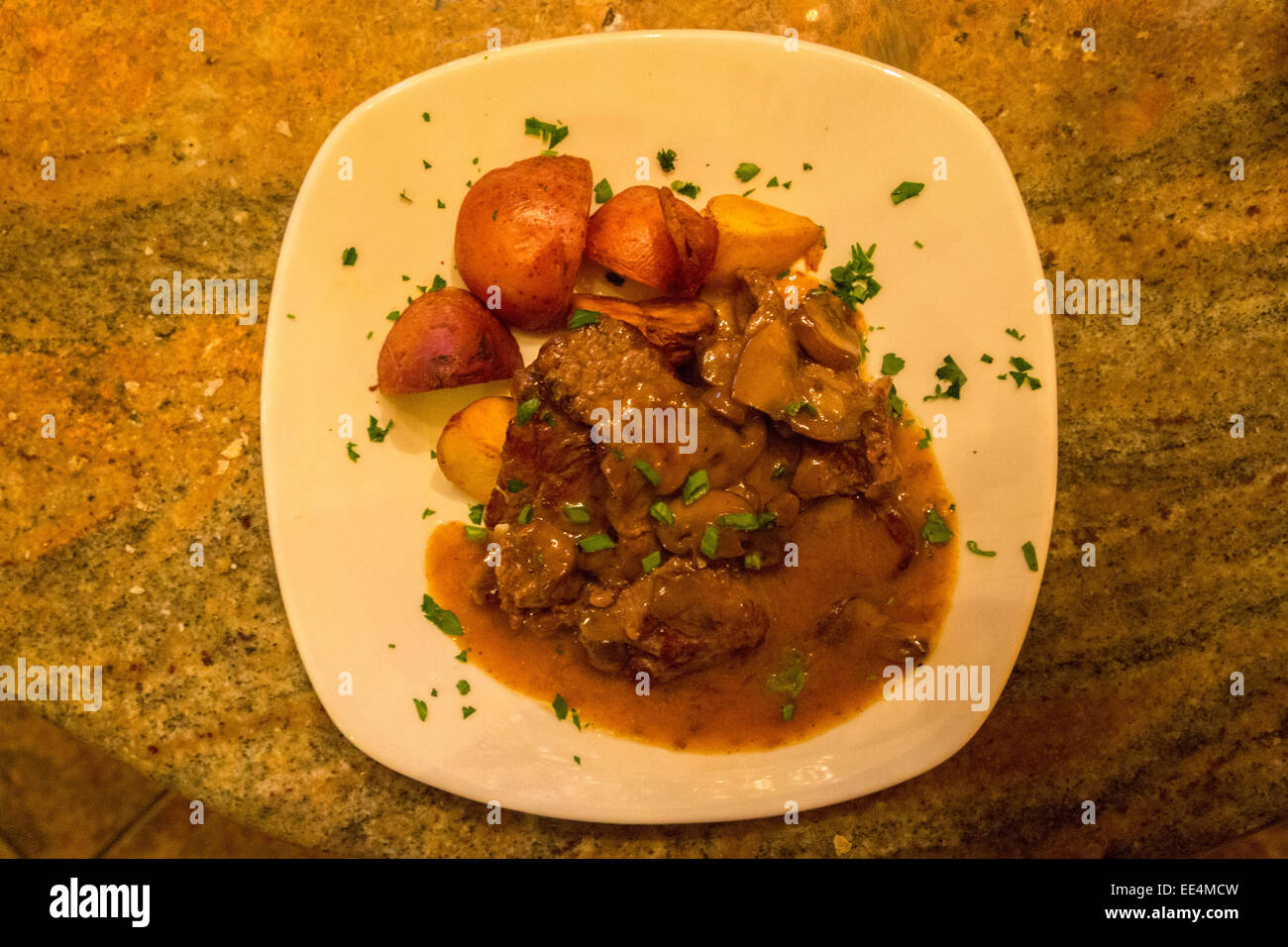 French Quarter, New Orleans, Louisiana.  Medallions of beef, Orleans Grape Vine Bistro. Stock Photo