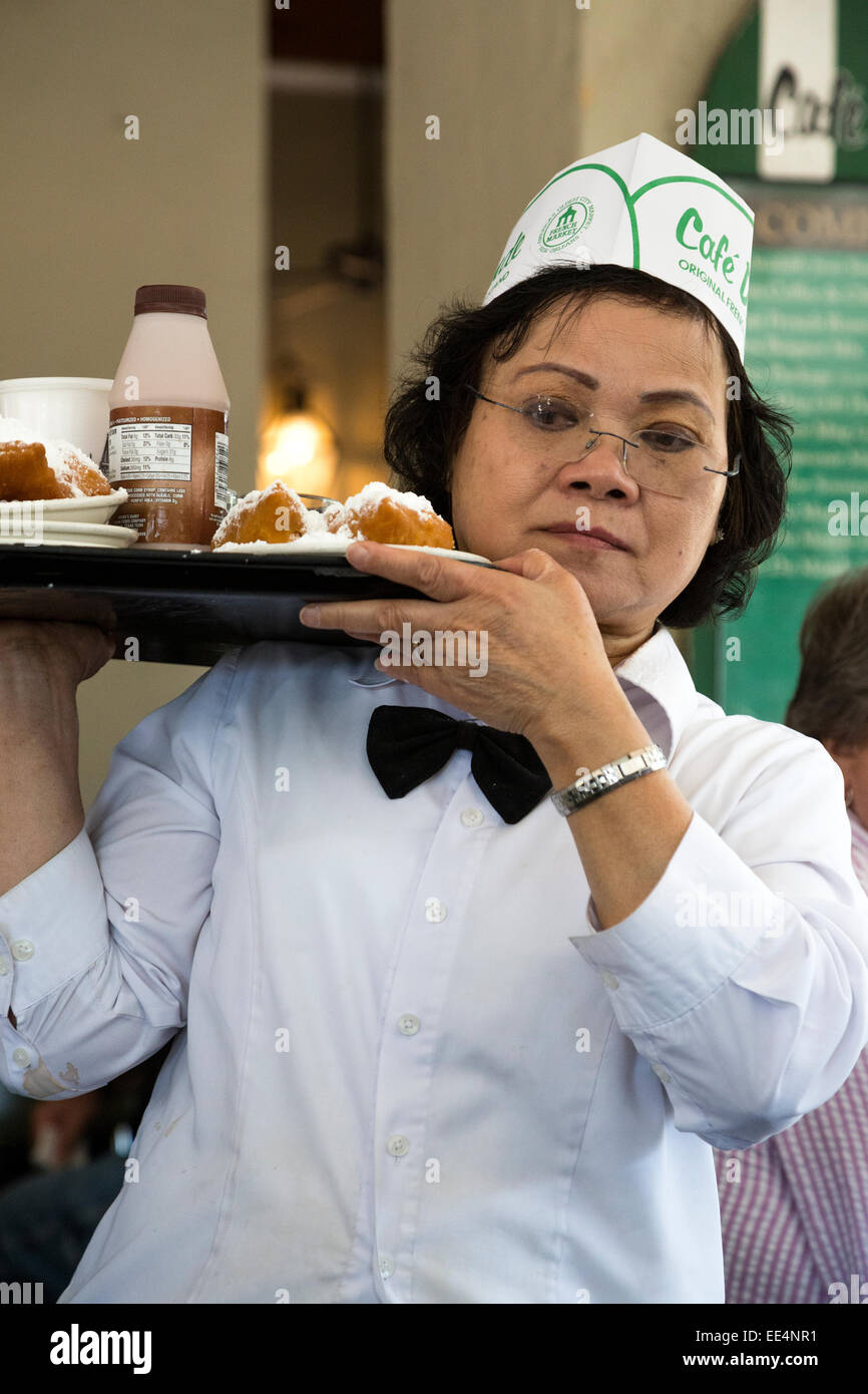 French Quarter New Orleans, Louisiana. Waitress Delivering and