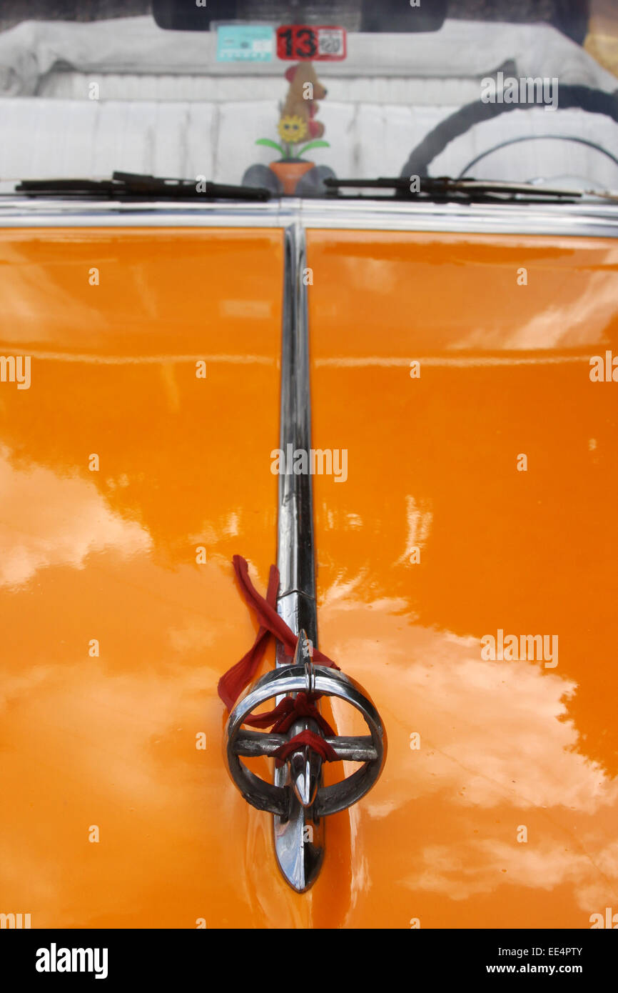 The hood of a vintage convertible classic Buick car parked in Havana in Cuba with the 'gunsight' hood ornament Stock Photo
