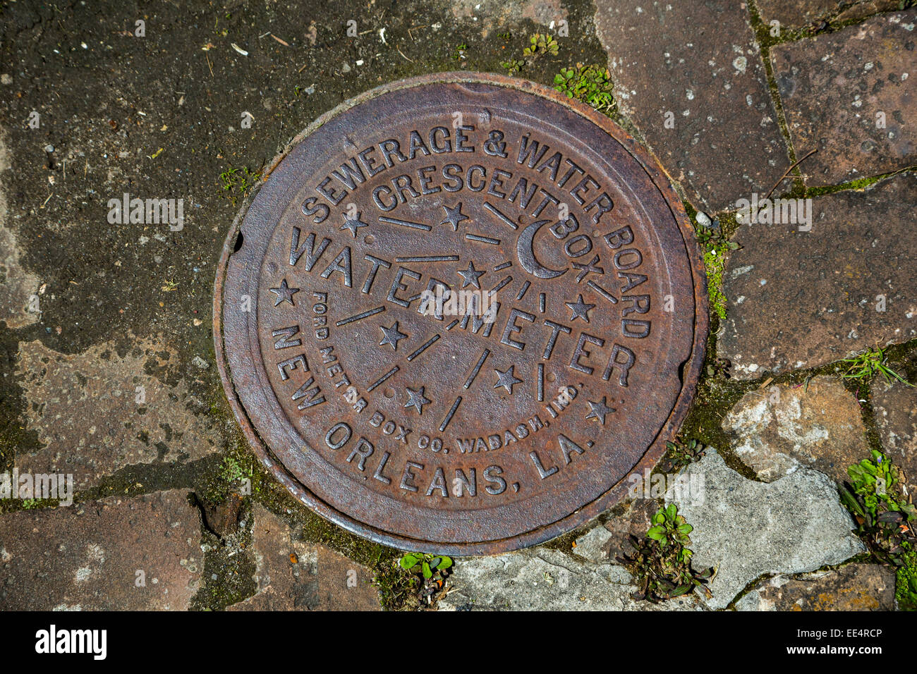 New Orleans, Louisiana. Water Meter Box Cover, Manufactured by Ford Meter  Box Company of Wabash, Indiana in the 1920s Stock Photo - Alamy