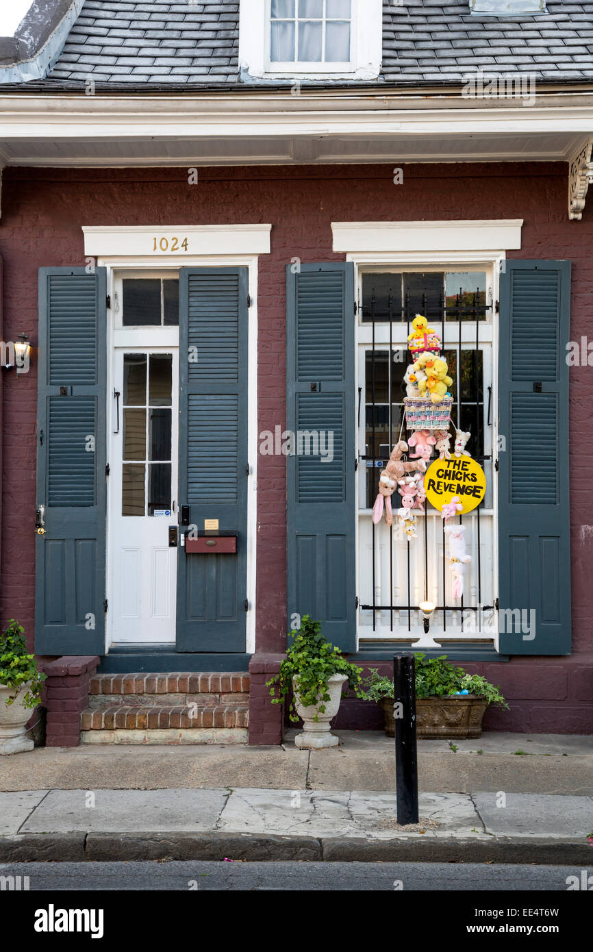 French Quarter, New Orleans, Louisiana.  Shotgun-style House with Window Decoration. Stock Photo