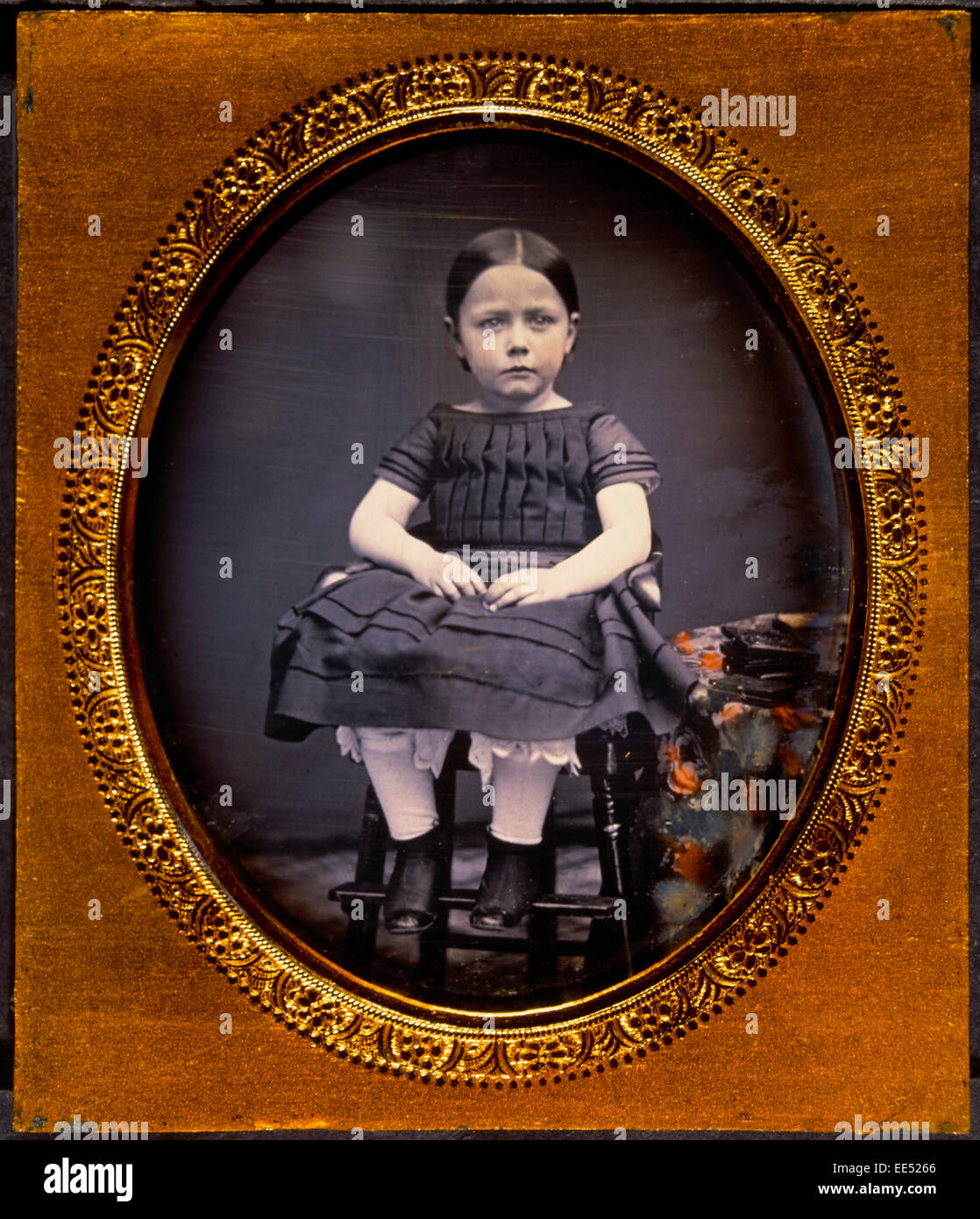 Young Girl Sitting in Chair, Portrait, Daguerreotype, circa 1850's Stock Photo