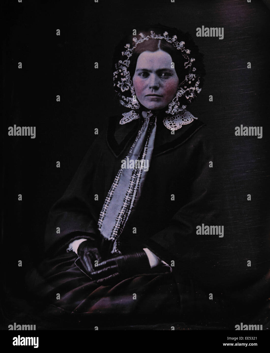 Woman in Bonnet and Coat, Seated Portrait, Daguerreotype, circa 1850's Stock Photo