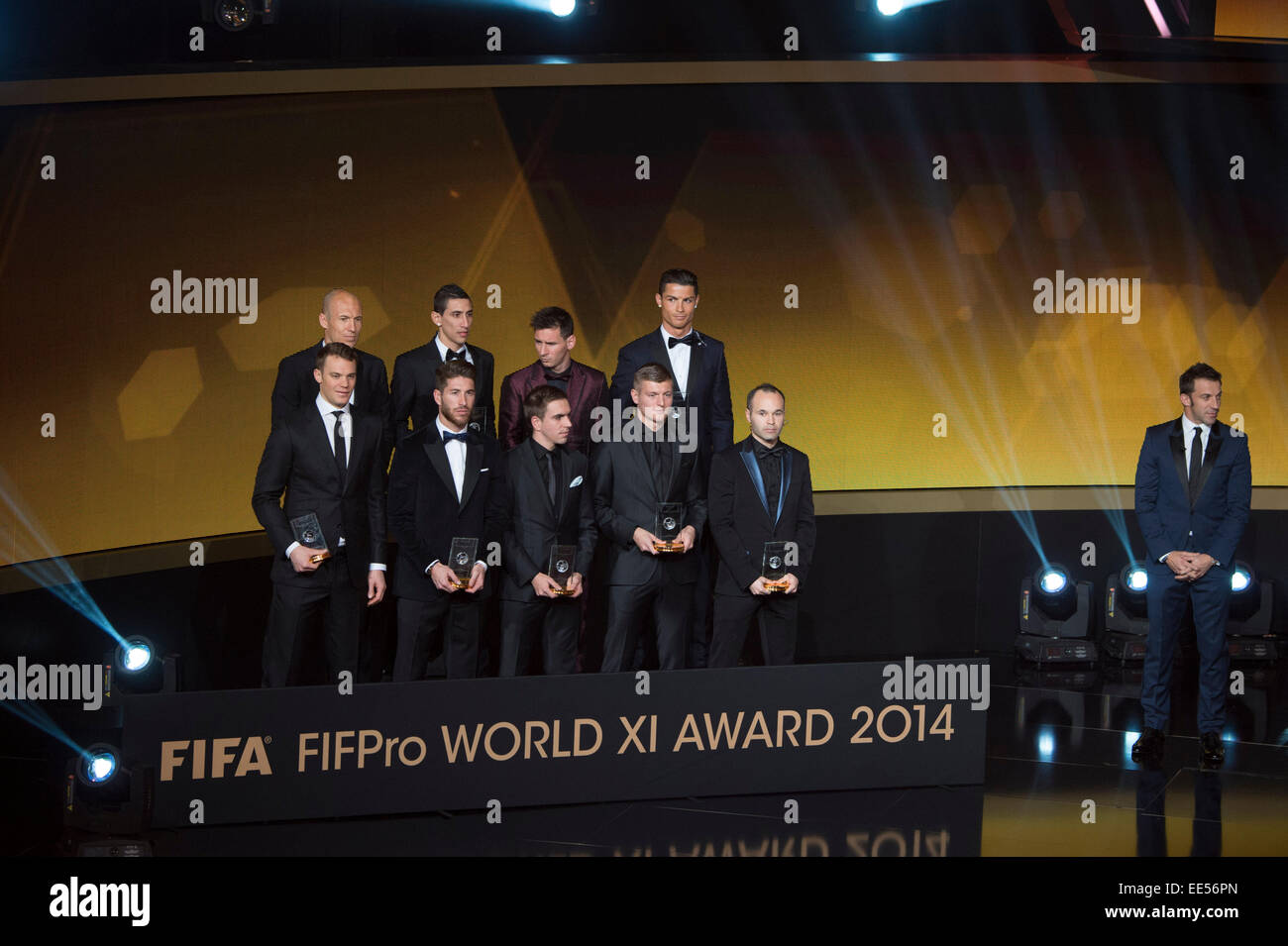 Zurich, Switzerland. 12th Jan, 2015. Winners of FIFA/FIFPro World XI 2014 Football/Soccer : Winners of the FIFA/FIFPro World XI 2014 (Top row - L to R) Arjen Robben, Angel Di Maria, Lionel Messi, Cristiano Ronaldo, (Bottom row - L to R) Manuel Neuer, Sergio Ramos, Philipp Lahm, Toni Kroos and Andres Iniesta pose with their trophies as Alessandro Del Piero looks on during the FIFA Ballon d'Or 2014 Gala at Kongresshaus in Zurich, Switzerland . © Maurizio Borsari/AFLO/Alamy Live News Stock Photo