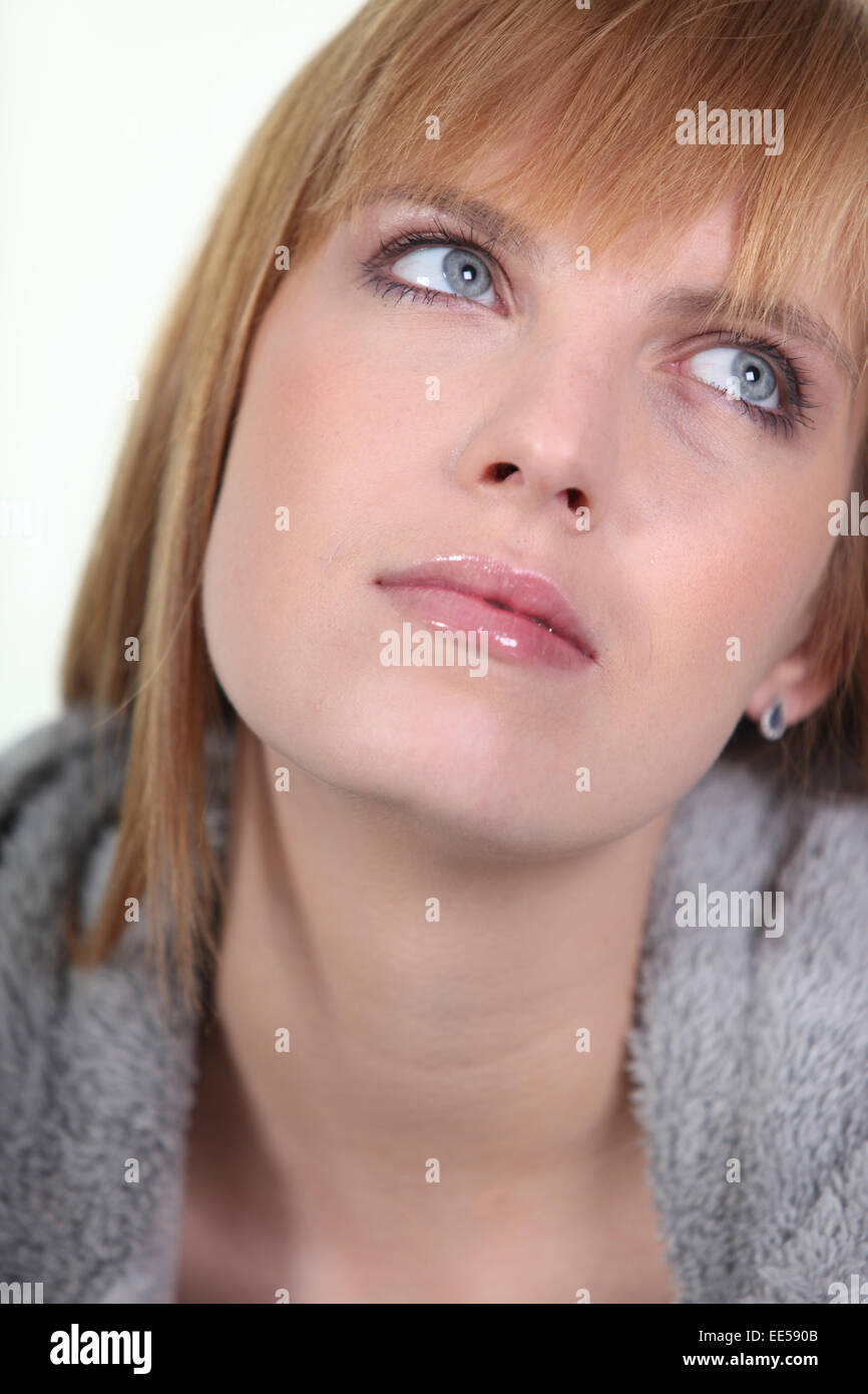 Portrait of a woman with a longing look Stock Photo - Alamy