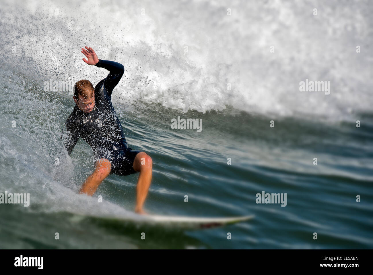 Male surfer beach hi-res stock photography and images - Alamy