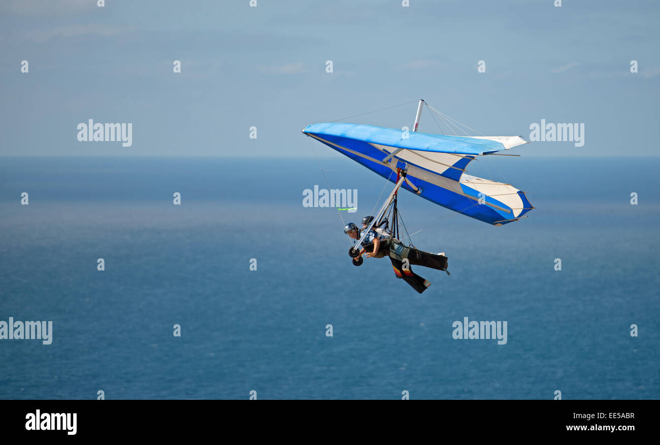 Tandem Hang Glider Soaring Above the Pacific Ocean at Torrey Pines Gliderport, La Jolla, California USA Stock Photo