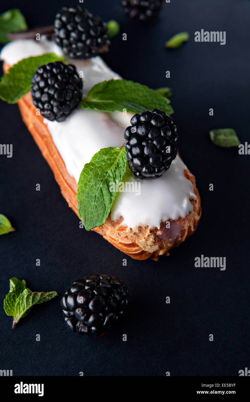 exquisite cream dessert eclair Stock Photo Alamy