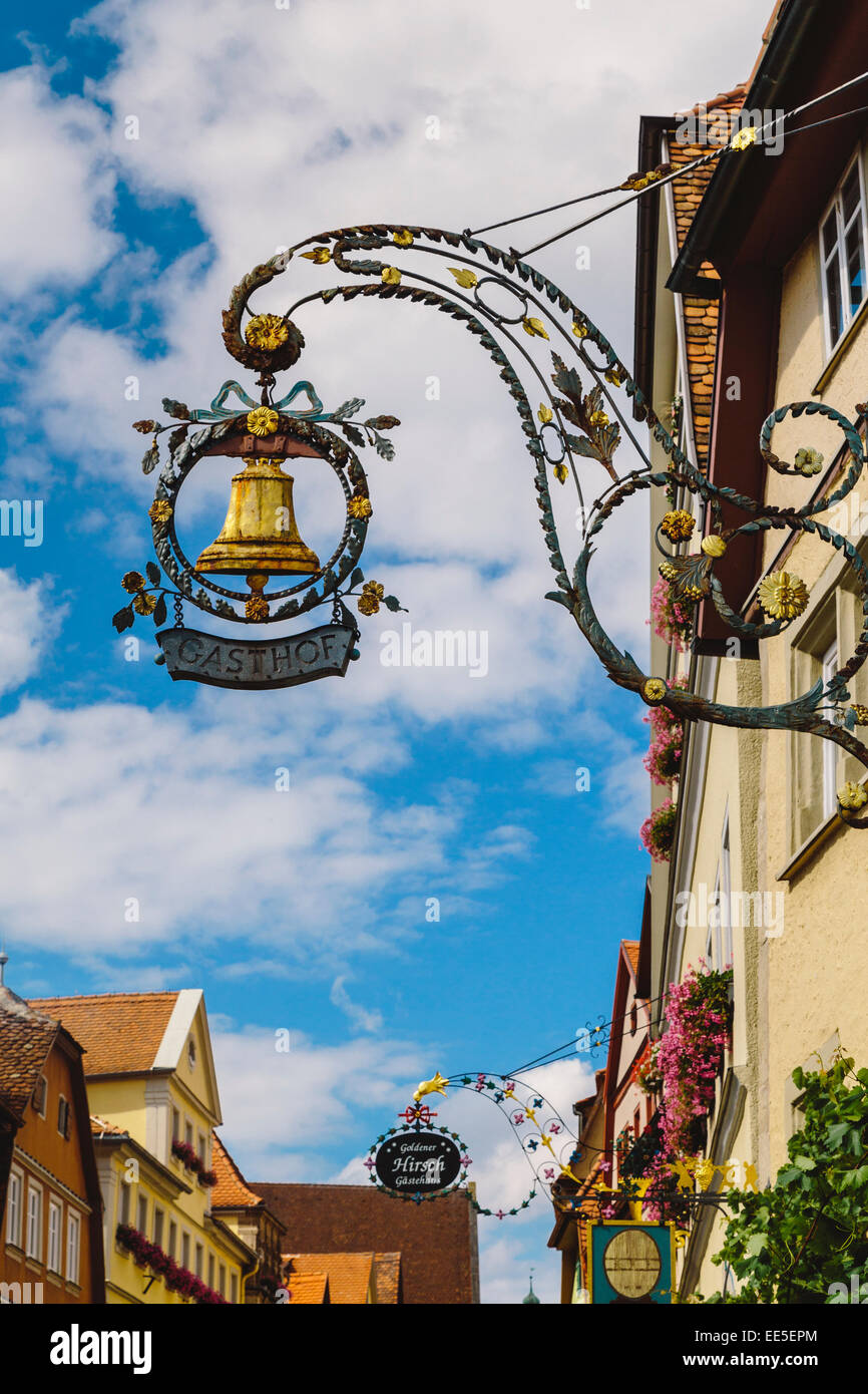 Traditional hanging shop sign for hotel, Rothenburg ob der Tauber, Romantic Road, Bavaria, Germany Stock Photo