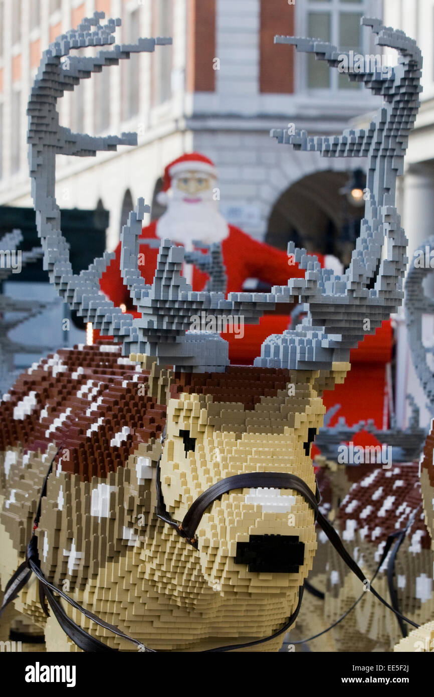 Reindeer and Father Christmas made from Lego displayed in covent Gardens london England Stock Photo