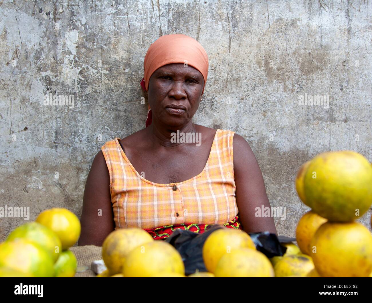 Lady selling oranges in Ghana market Stock Photo Alamy