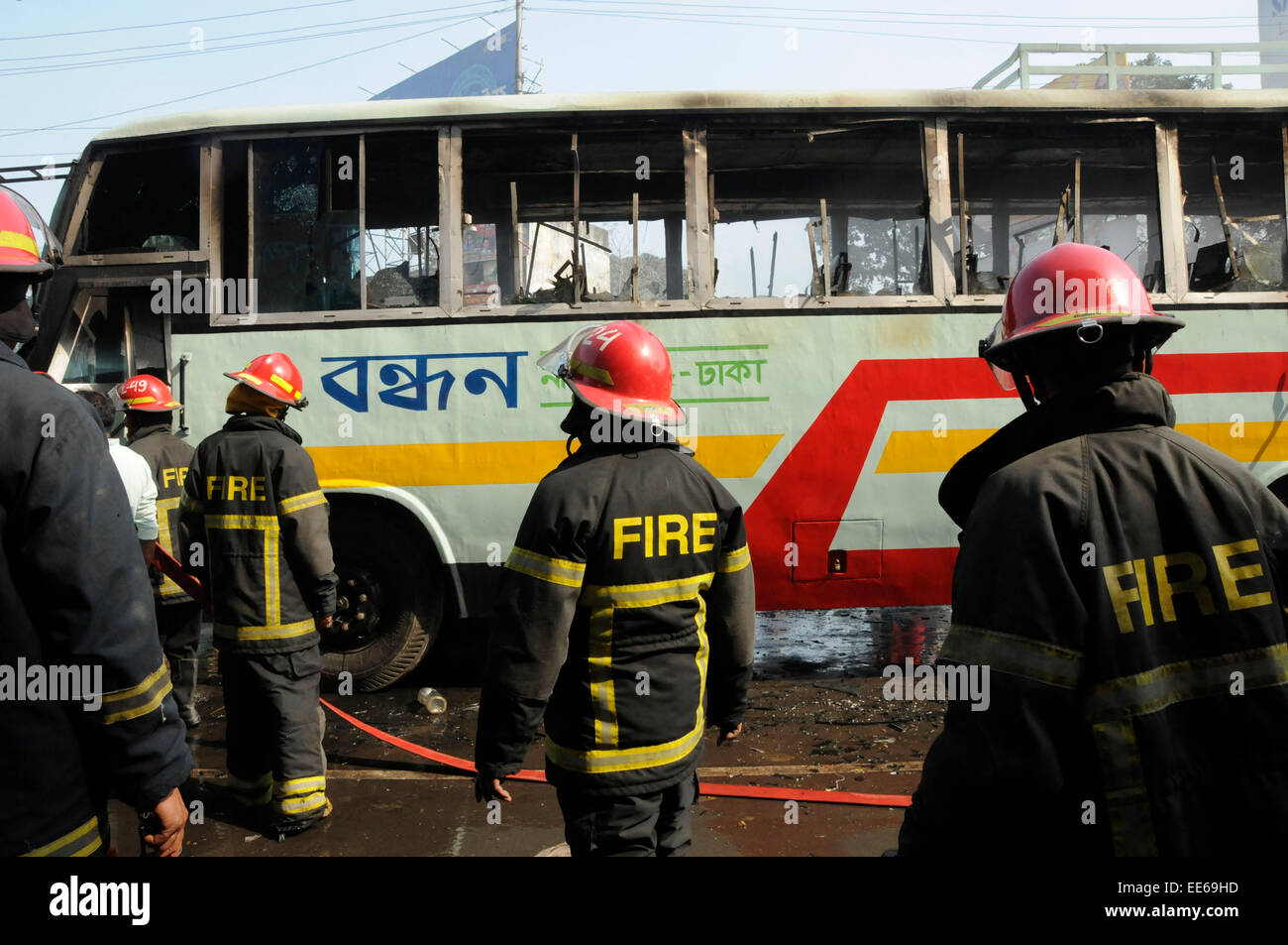 Dhaka, Bangladesh. 14th Jan, 2015. Firefighters try to extinguish fire ...