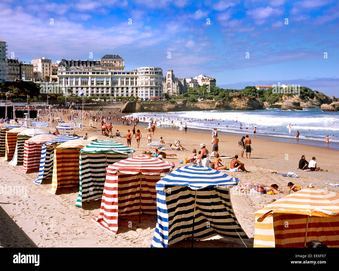 Biarritz, Aquitaine, France. Beach and colourful tents, looking towards ...