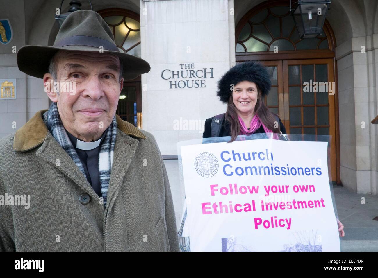 London, UK. 14th Jan, 2015. Victoria Harvey ( in Black hat)daughter  of  Rev  Dr Anthony Harvey (LHS), former Subdean of Westminster Abbey just before she  chains herself to the railings of  Church House in deans Yard beside  Westminster Abbey  in  protest over  an out of town retail park  in  Leighton Buzzard in Bedfordshire Because: - the Church Commissioners are not following their own  ethical policy of   listening to local  communities. Credit:  adrian arbib/Alamy Live News Stock Photo