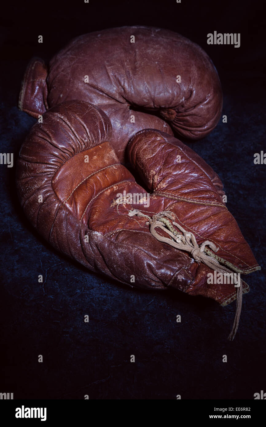 Old leather boxing gloves circa 1930. Stock Photo