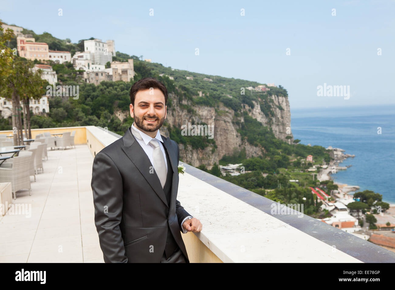 Young Italian groom with beard, brown hair and green eyes before marriage in Sorrento peninsula, Italy. Stock Photo