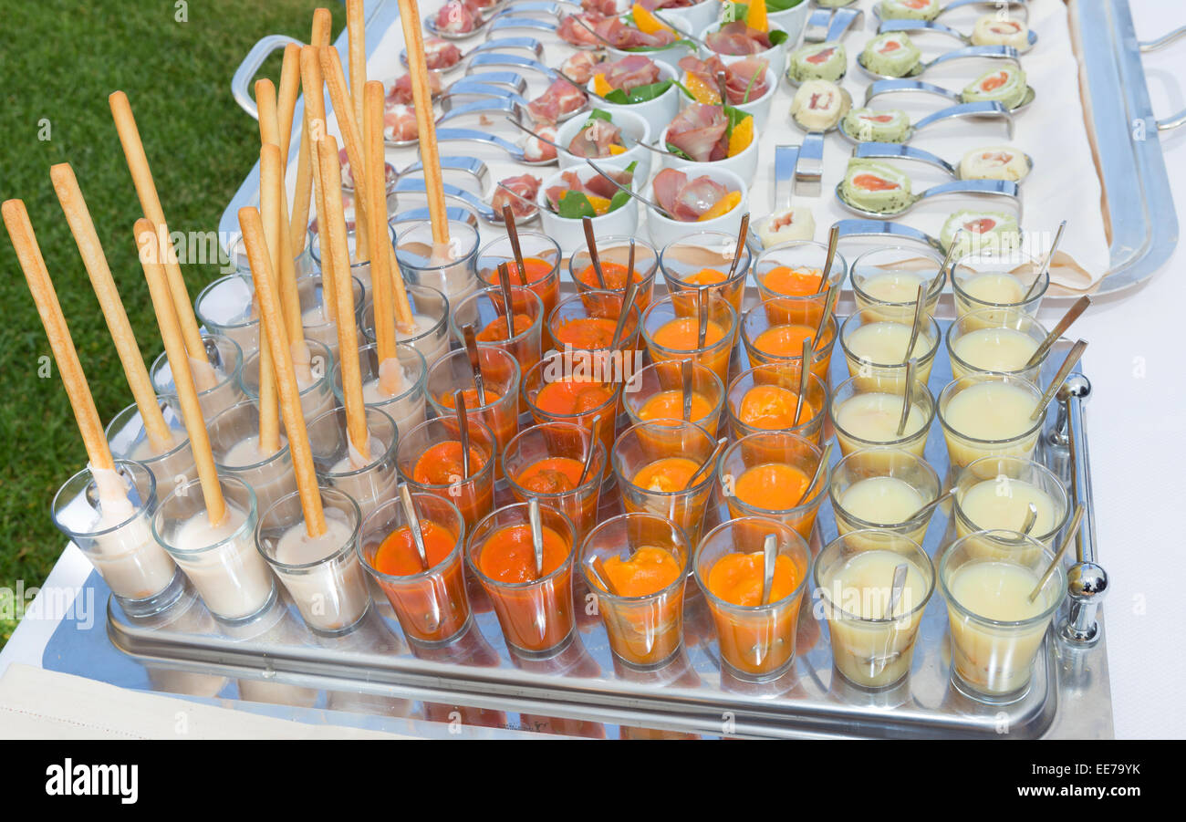 Slicing different types of meat. Wedding buffet Stock Photo - Alamy