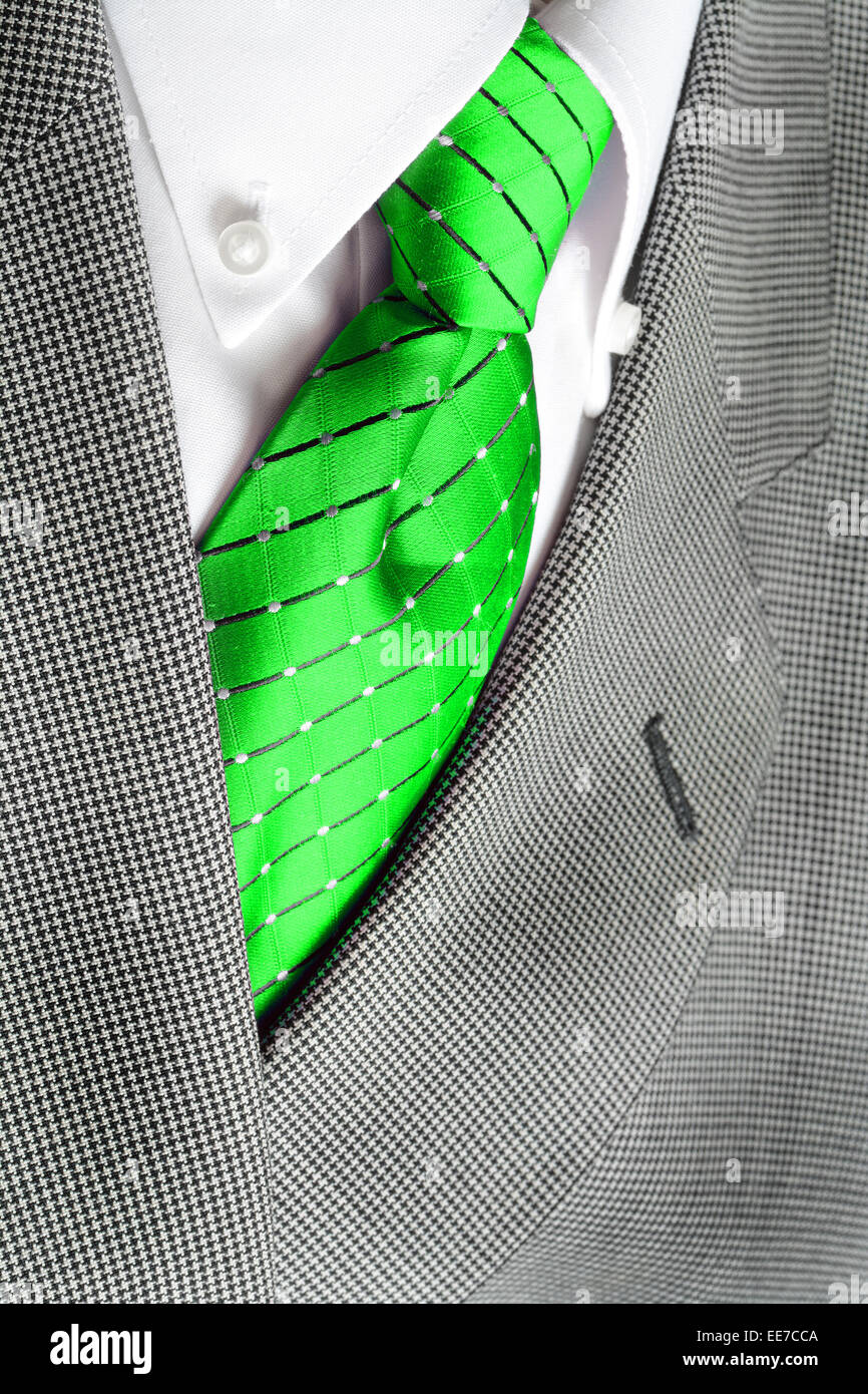 White dress shirt with green tie and suit jacket detailed closeup Stock Photo