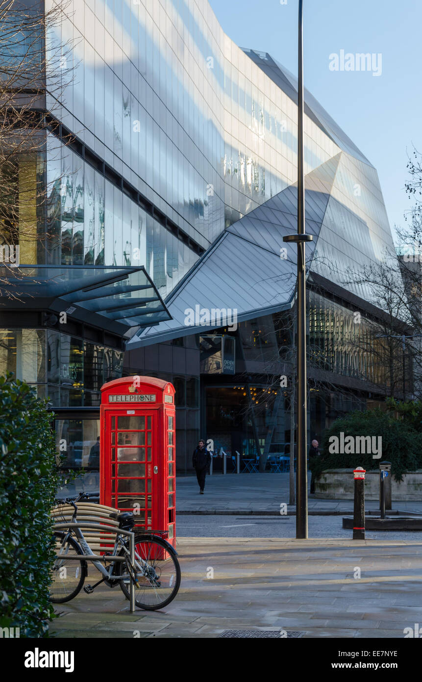 Red telephone box next to One New Change shopping centre. London, UK Stock Photo