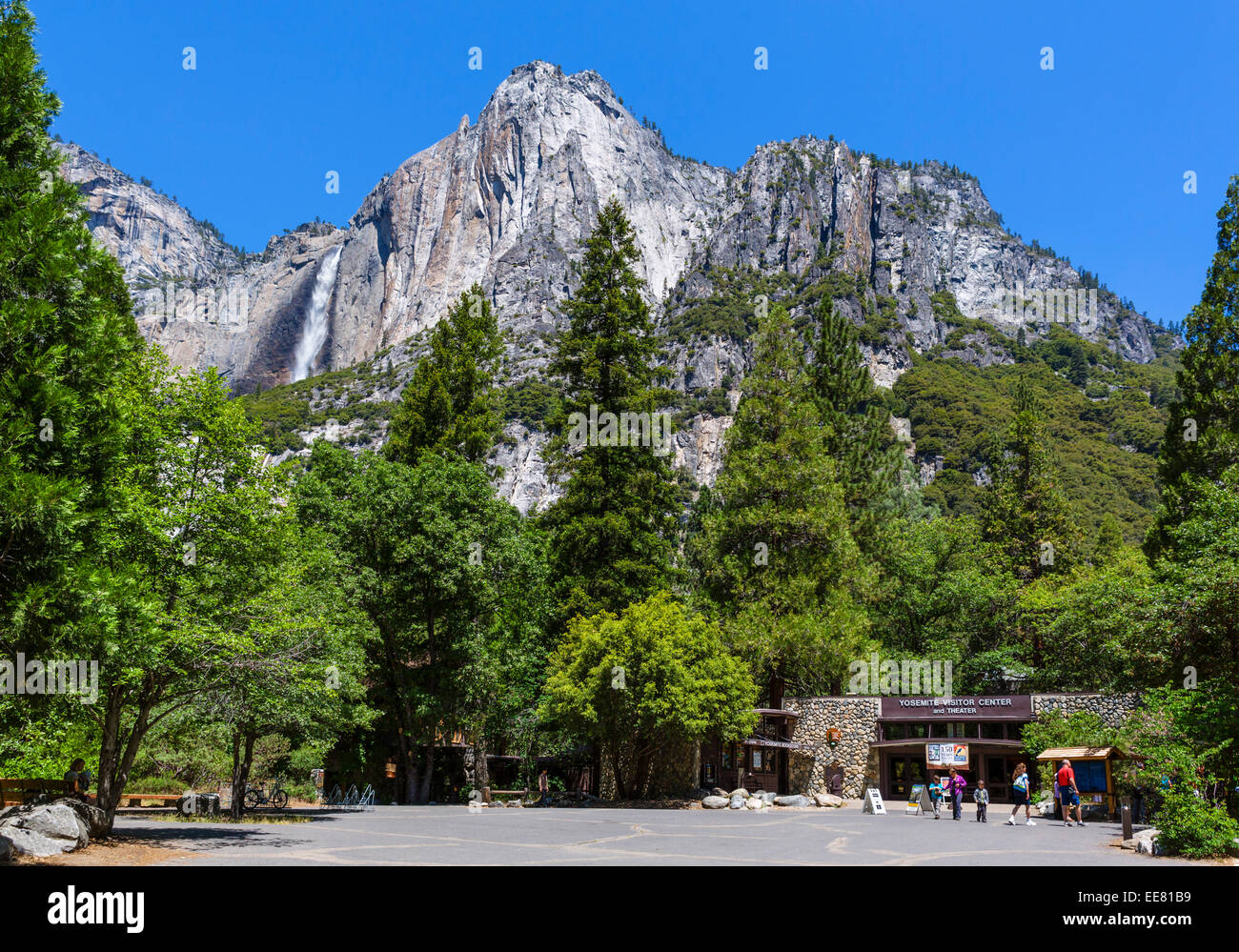 Visitor Center at Yosemite Village with Yosemite Falls in distance