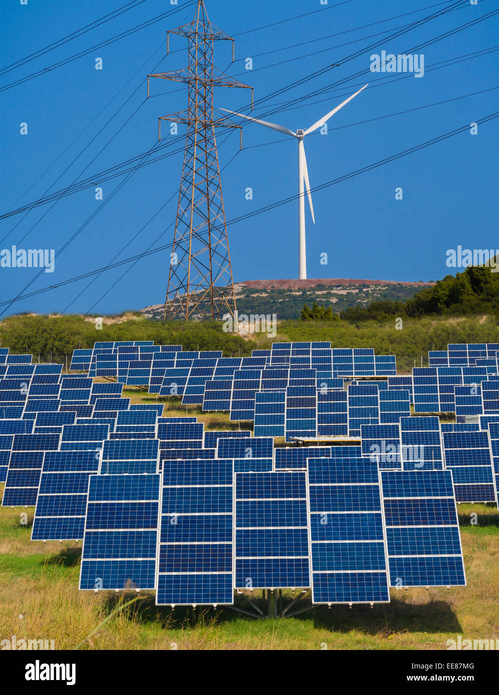 Renewable green solar energy, wind turbines and electricity towers Stock Photo Alamy