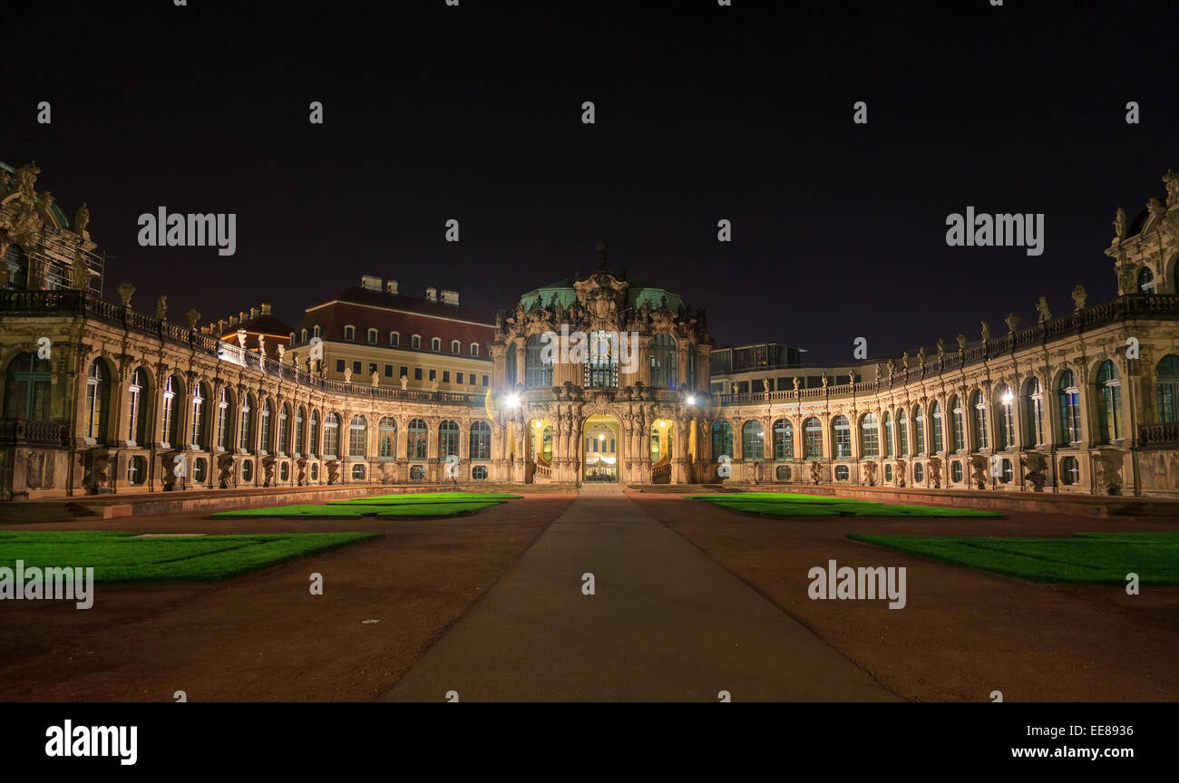 Dresden Zwinger palace panorama with illumination at night, Germany Stock Photo