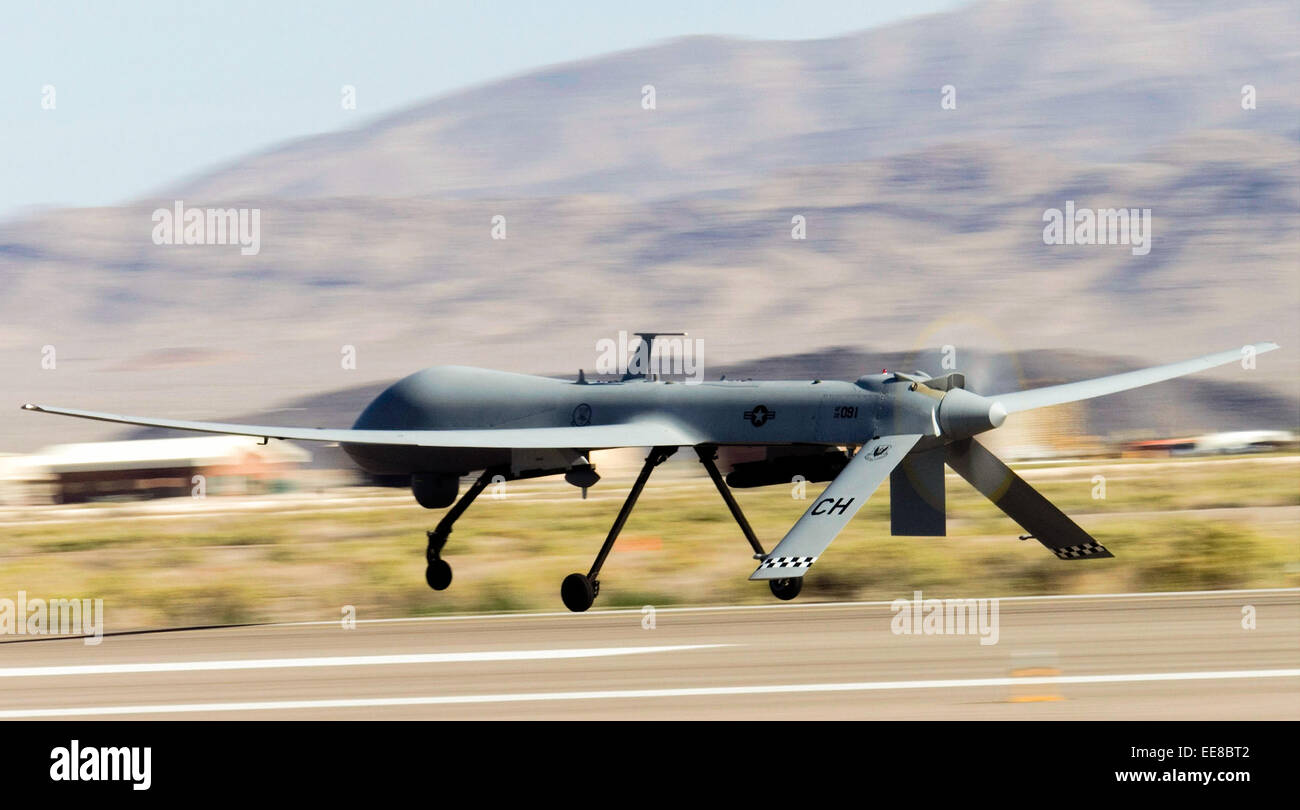 MQ-1 Predator unmanned aerial vehicle (UAV) takes off from Creech Air Force Base, Nevada. See description for more information. Stock Photo