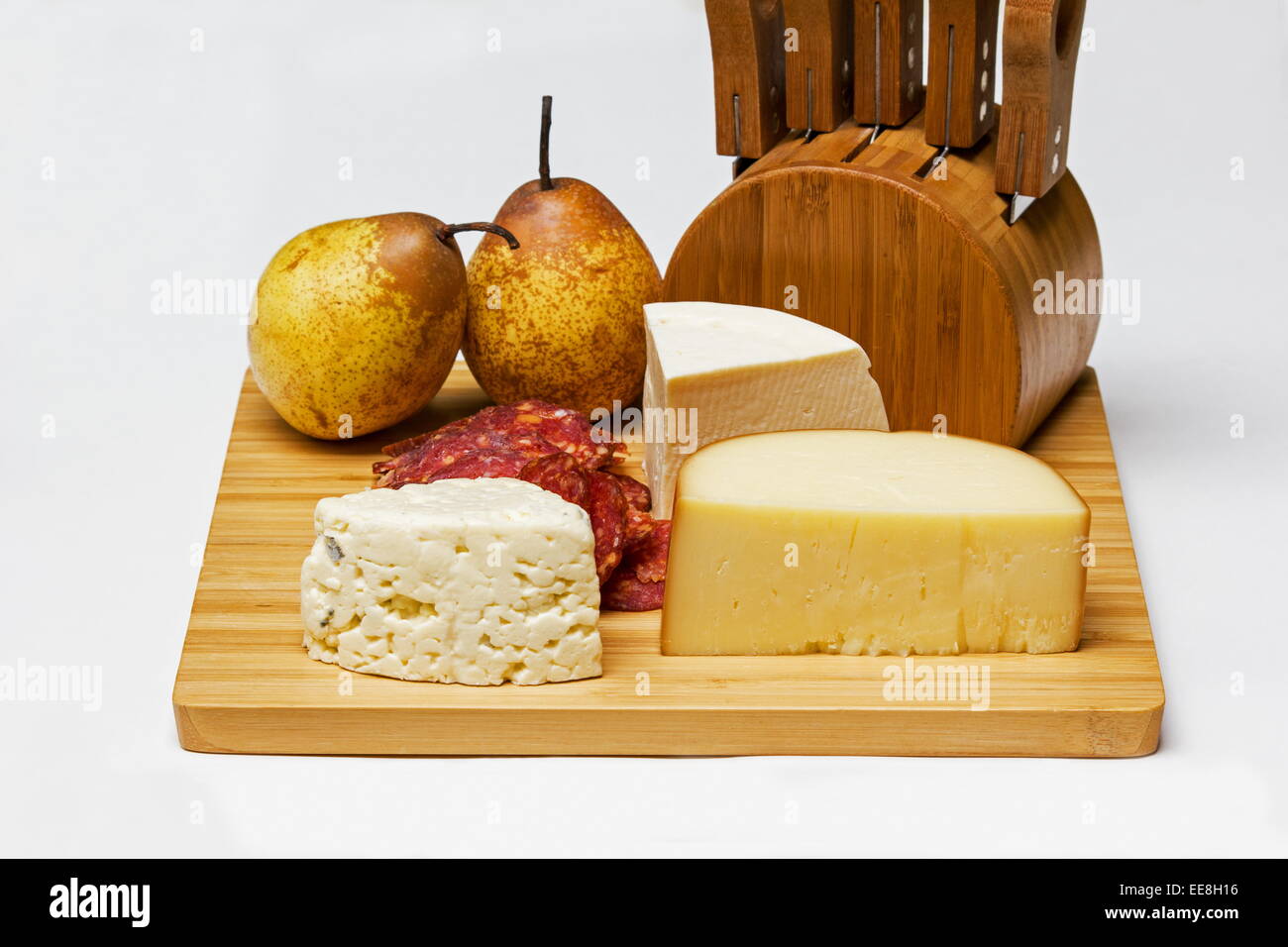 Cheese board with cheese salami and pears Stock Photo Alamy