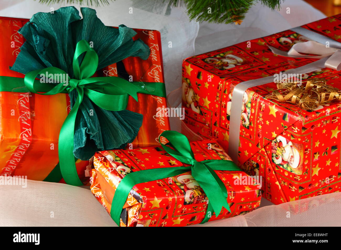 Christmas gifts are in boxes under the Christmas tree Stock Photo