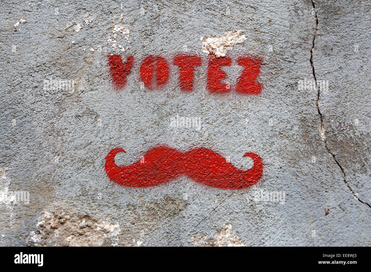 A graffiti of the word 'votez', or vote in French. Stock Photo