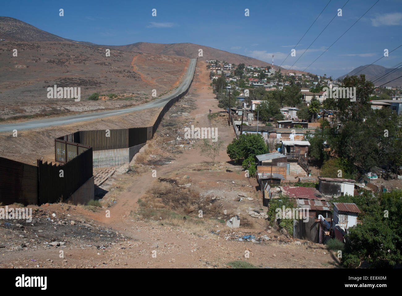 The US-Mexican border line from Tijuana in Mexico. Stock Photo