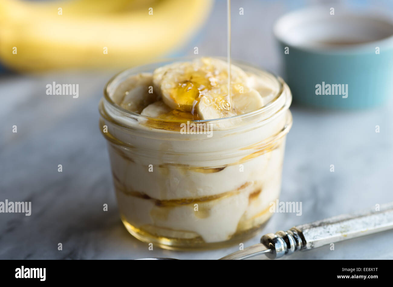 Grass fed Greek yogurt parfait with honey and bananas Stock Photo Alamy