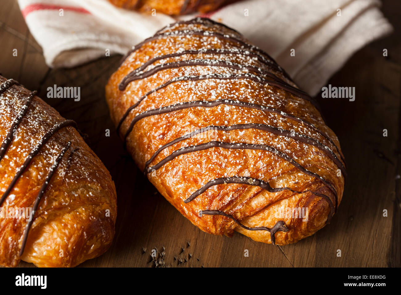 Homemade Chocolate Croissant Pastry with Powdered Sugar Stock Photo