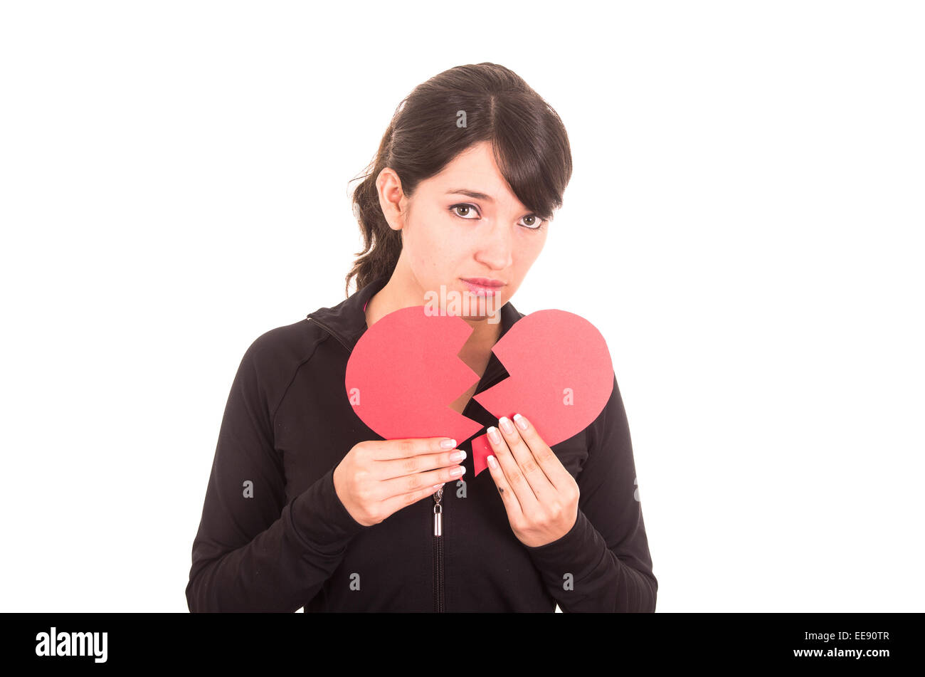 beautiful sad young girl holding a broken red heart concept of ...