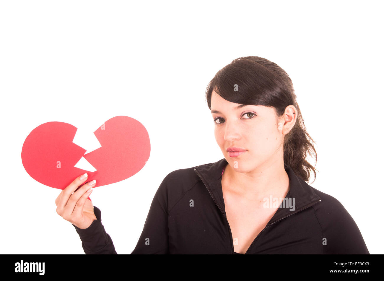 beautiful sad young girl holding a broken red heart concept of ...