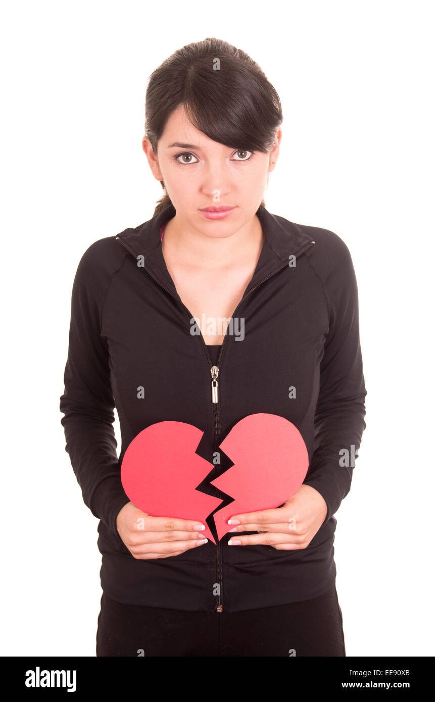 beautiful sad young girl holding a broken red heart concept of ...