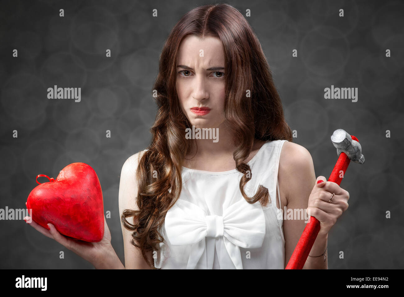 Woman with broken heart Stock Photo