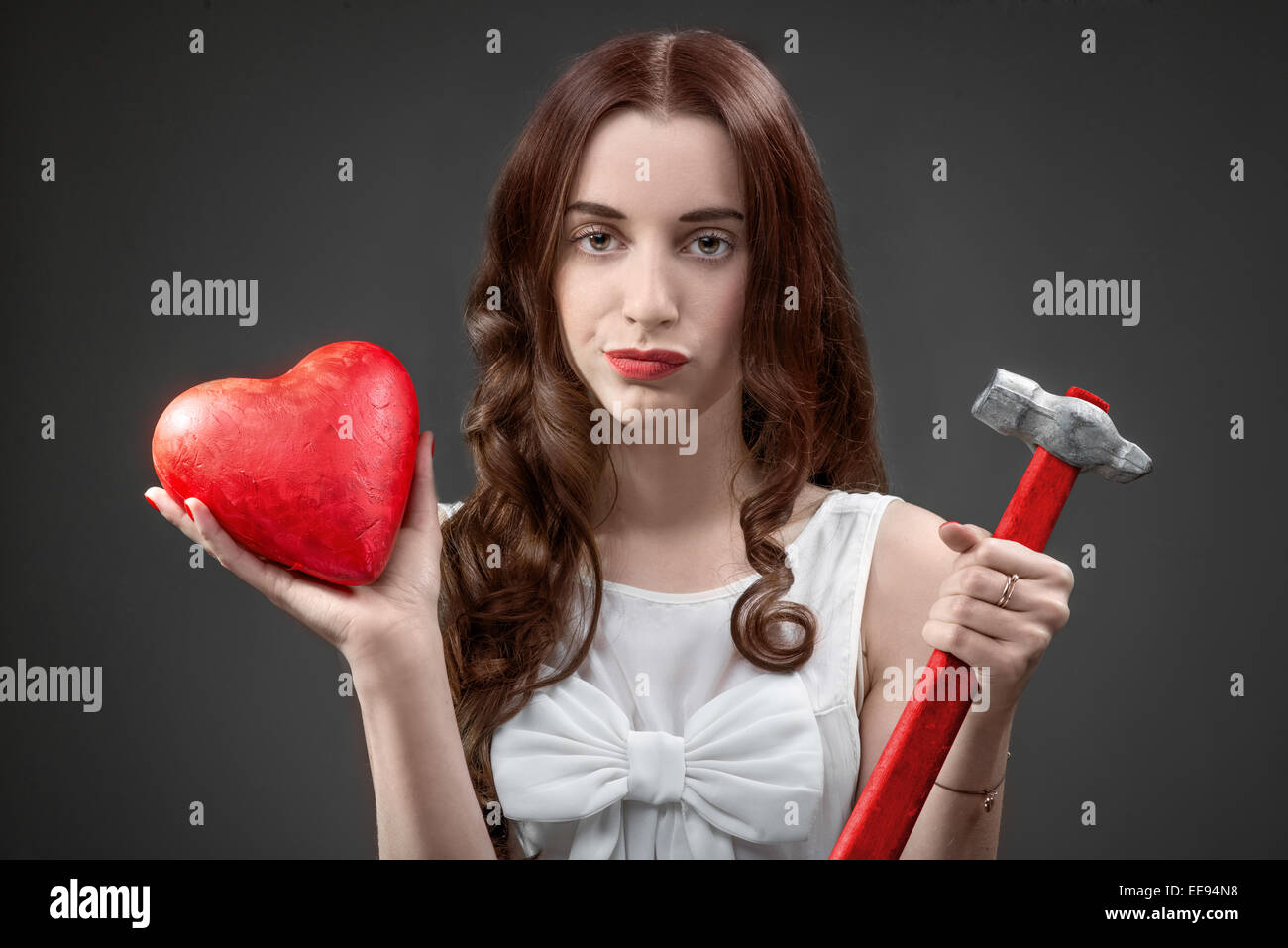 Woman with broken heart Stock Photo