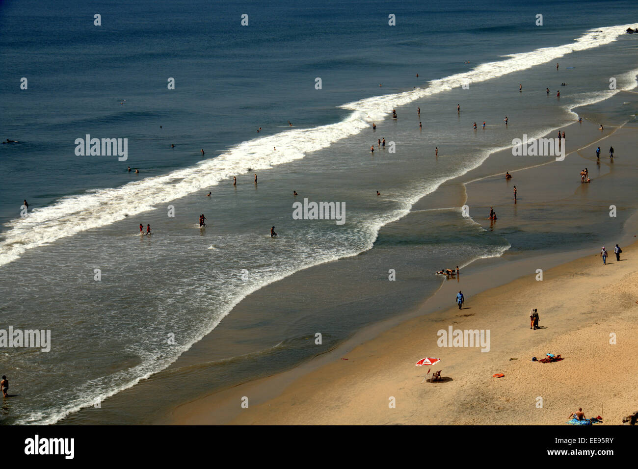 tourists enjoying in the beaches of papanasam,varkala,thiruvananthapuram,kerala,india Stock Photo