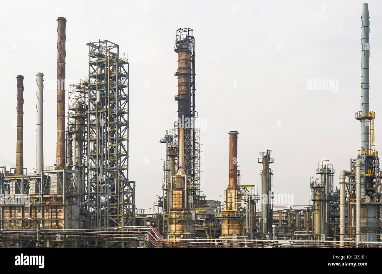 A part  of an oil and gas refinery with various petrochemical installations Stock Photo