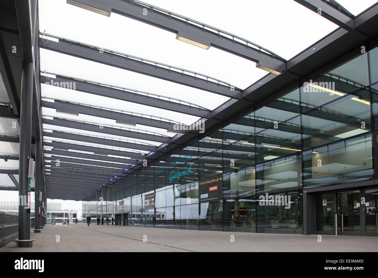 The main public entrance to Gatwick Airport's North Terminal is almost desterted during a quiet period. Stock Photo