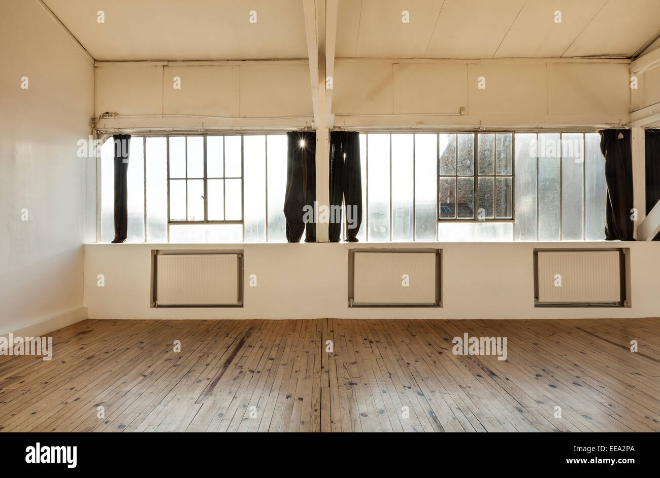 wide loft, beams and wooden floor Stock Photo - Alamy
