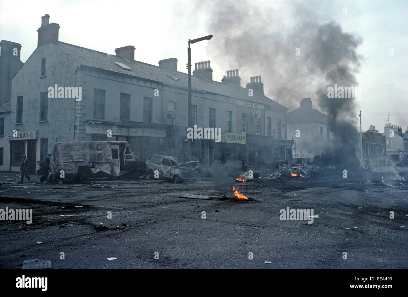 BELFAST, NORTHERN IRELAND - August 1976. Morning after a night of Riots in the Falls Road, West Belfast during The Troubles, Northern Ireland. Stock Photo