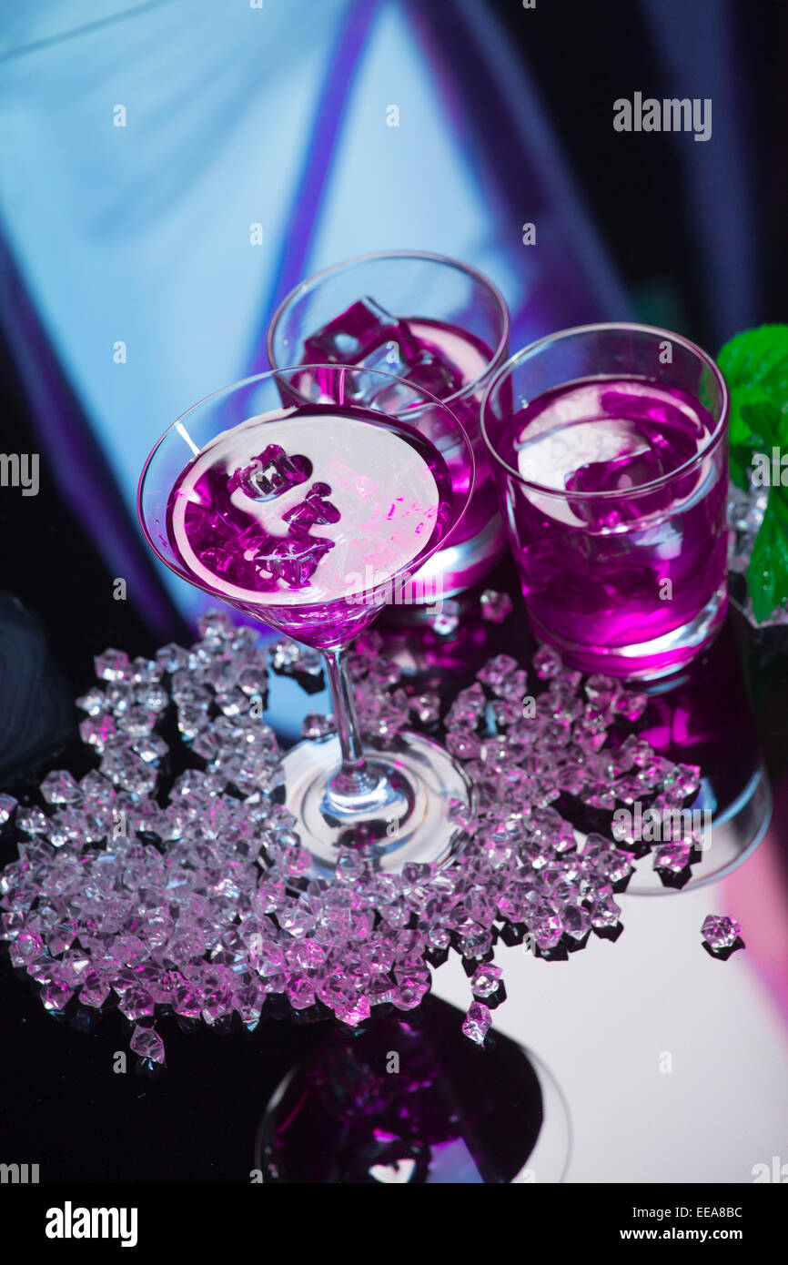 Violet coctail with ice   cubes Stock Photo