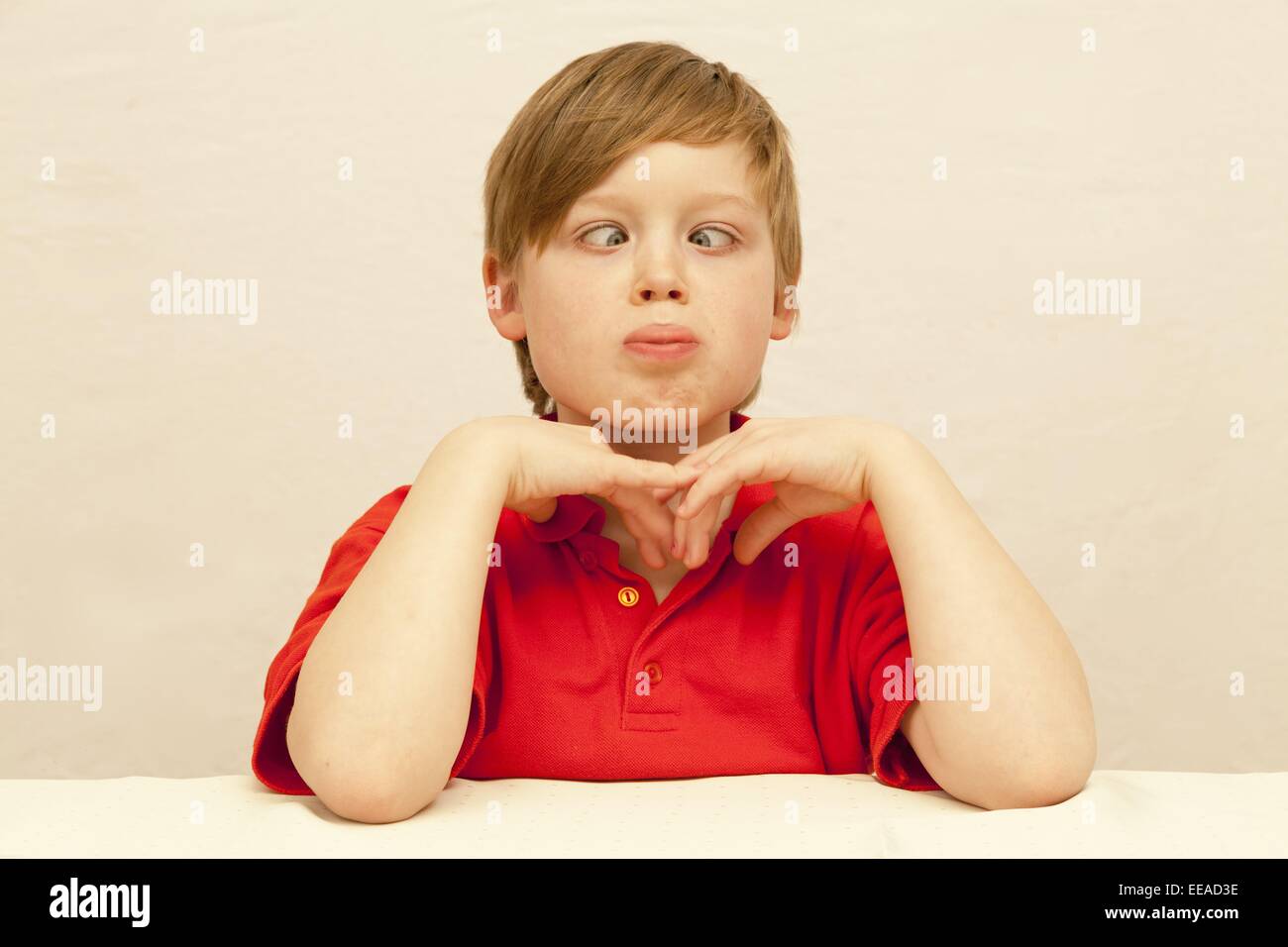 young boy making faces Stock Photo
