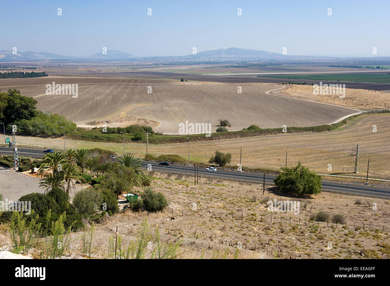 The Jezreel valley as seen from the ancient city Megiddo, left from the middle is mount Tabor Stock Photo