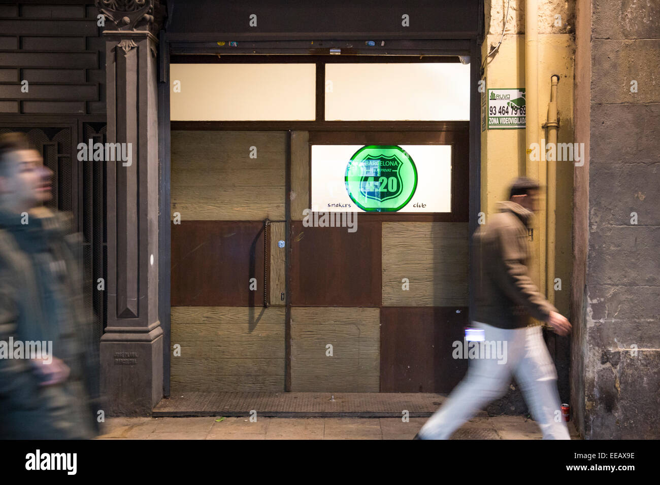 Pedestrians walk pass the entrance to the '420 Smokers Club' in